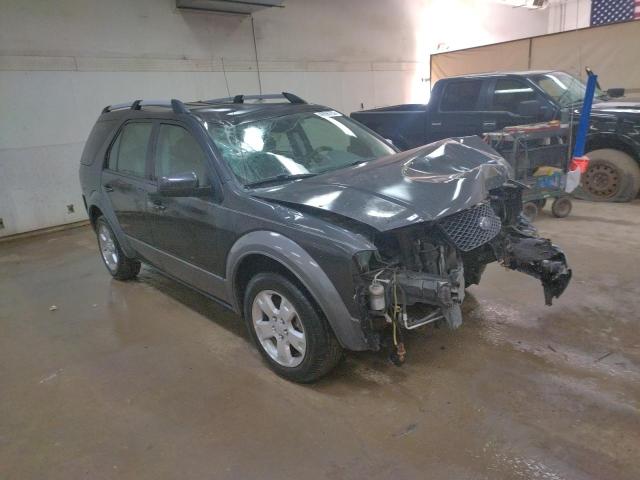 1FMZK02117GA13845 - 2007 FORD FREESTYLE SEL BLACK photo 4