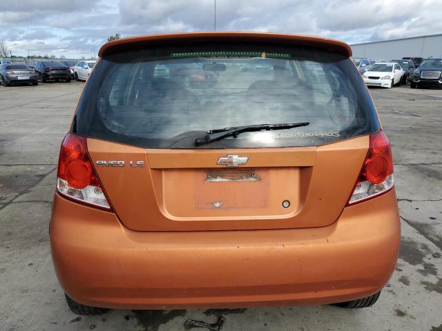 KL1TD666X6B515334 - 2006 CHEVROLET AVEO BASE ORANGE photo 6