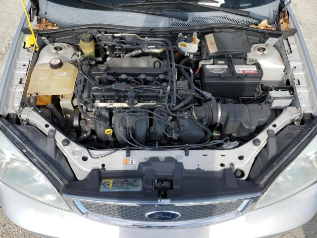 1FAFP34N75W107098 - 2005 FORD FOCUS ZX4 SILVER photo 11