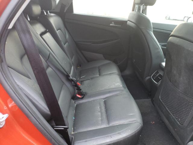 KM8J3CA22GU202186 - 2016 HYUNDAI TUCSON LIMITED ORANGE photo 11