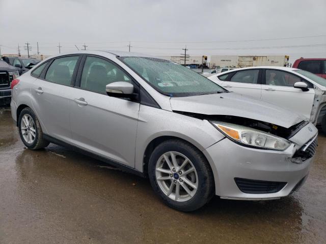 1FADP3F20FL275453 - 2015 FORD FOCUS SE SILVER photo 4