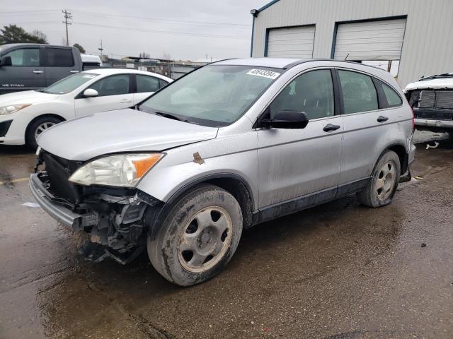 JHLRE4H30AC000906 - 2010 HONDA CR-V LX SILVER photo 1