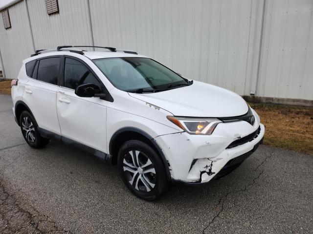 2T3ZFREV7HW349338 - 2017 TOYOTA RAV4 LE WHITE photo 1