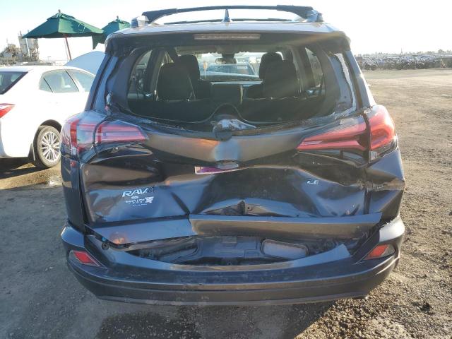 2T3ZFREV7JW415277 - 2018 TOYOTA RAV4 LE GRAY photo 6