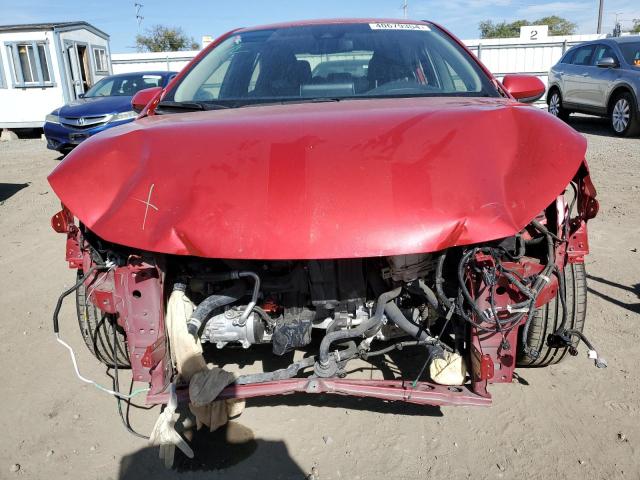 JTDEAMDE9MJ018030 - 2021 TOYOTA COROLLA LE RED photo 5