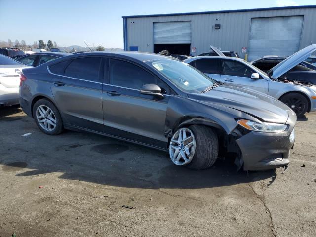 3FA6P0H70FR164595 - 2015 FORD FUSION SE GRAY photo 4