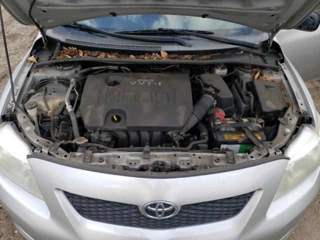 1NXBU4EE6AZ385336 - 2010 TOYOTA COROLLA BASE SILVER photo 11