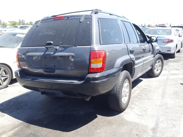 1J4GX48SX3C594584 - 2003 JEEP GRAND CHER LAREDO BLACK photo 4