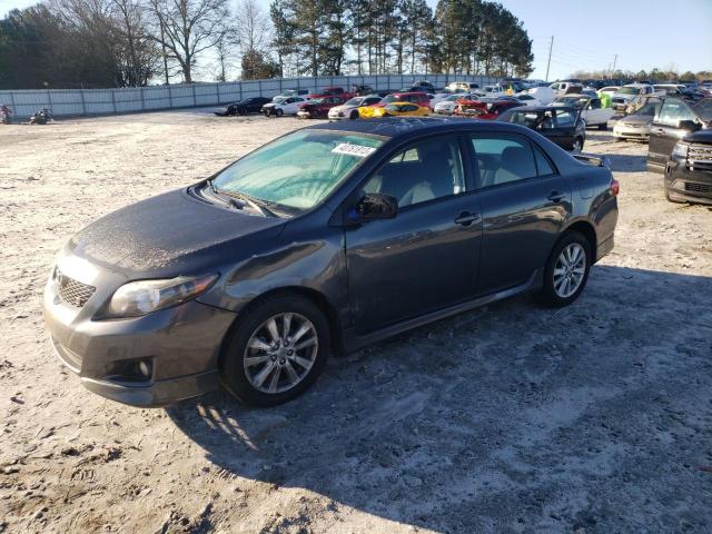 1NXBU4EE8AZ315708 - 2010 TOYOTA COROLLA BASE BLACK photo 1