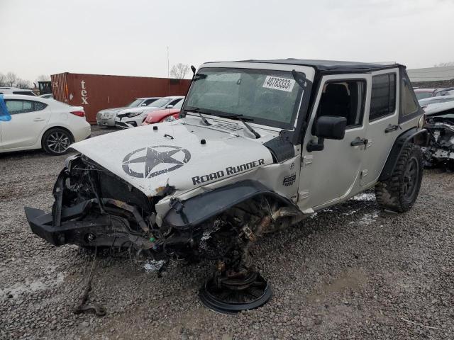 1J4BA5H15BL521842 - 2011 JEEP WRANGLER U SAHARA SILVER photo 1