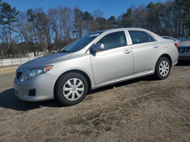 1NXBU4EE2AZ212980 - 2010 TOYOTA COROLLA BASE SILVER photo 1