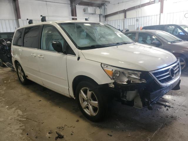 2V8HW54X99R546146 - 2009 VOLKSWAGEN ROUTAN SEL WHITE photo 4