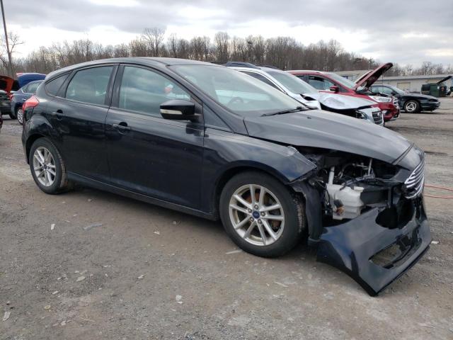 1FADP3K21GL232179 - 2016 FORD FOCUS SE BLACK photo 4