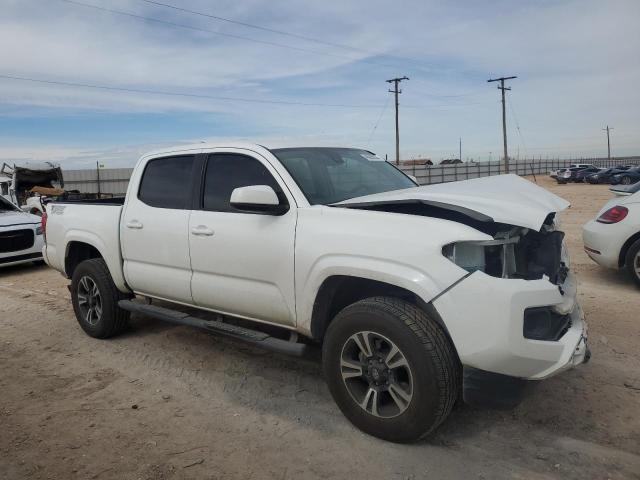 5TFAX5GN0KX140977 - 2019 TOYOTA TACOMA DOUBLE CAB WHITE photo 4