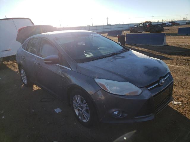 1FAHP3H23CL476872 - 2012 FORD FOCUS SEL GRAY photo 4