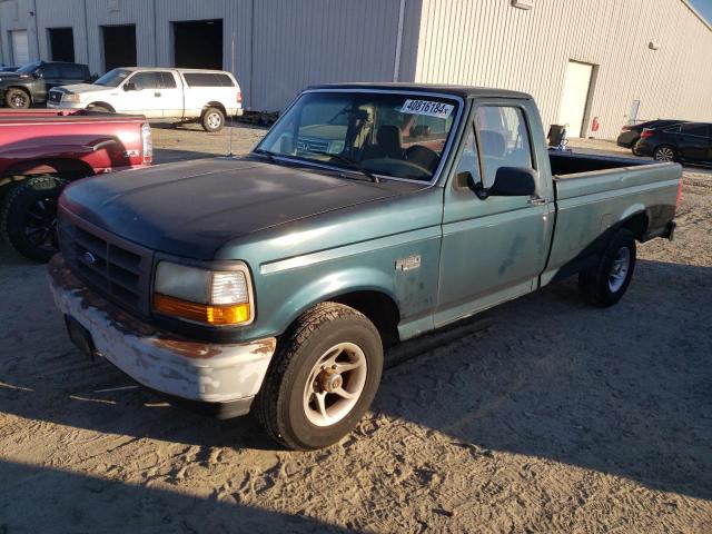 1FTEF15Y9SNB11984 - 1995 FORD F150 GREEN photo 1