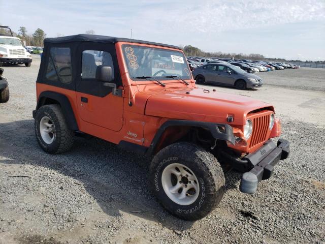 1J4FA29185P320559 - 2005 JEEP WRANGLER / SE ORANGE photo 1