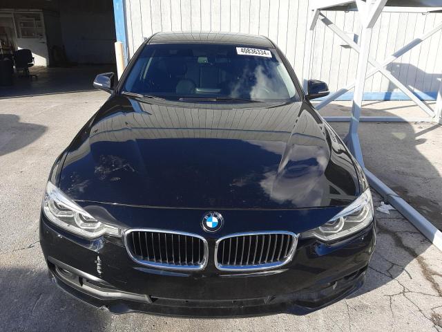 WBA8A9C57JAH12593 - 2018 BMW 320 I BLACK photo 5