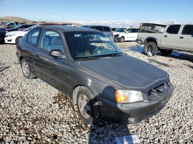 KMHCG35CX1U118575 - 2001 HYUNDAI ACCENT GS TAN photo 4