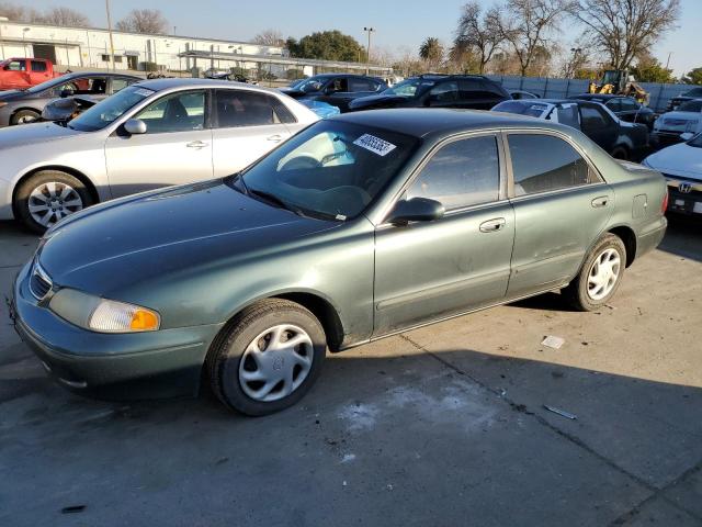 1YVGF22C0X5882276 - 1999 MAZDA 626 ES GREEN photo 1