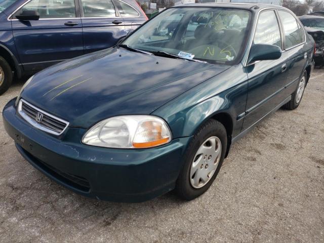 1HGEJ8645VL003298 - 1997 HONDA CIVIC EX GREEN photo 2