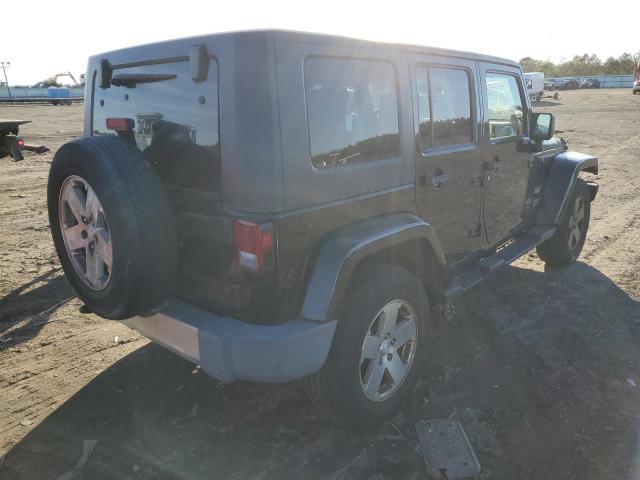 1J4GA59169L775722 - 2009 JEEP WRANGLER U SAHARA BLACK photo 3