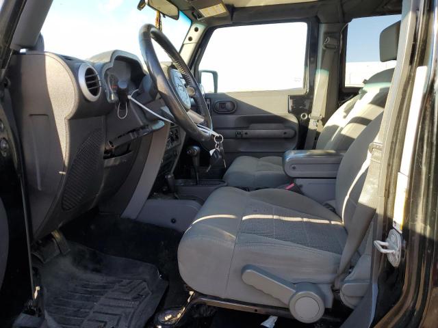 1J4GA59169L775722 - 2009 JEEP WRANGLER U SAHARA BLACK photo 7