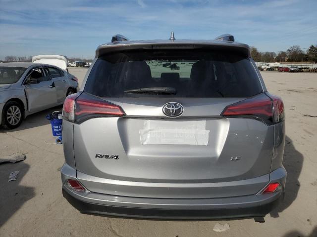 2T3ZFREV2GW276720 - 2016 TOYOTA RAV4 LE SILVER photo 6