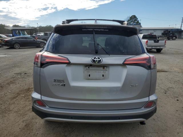 2T3WFREV8GW300425 - 2016 TOYOTA RAV4 XLE SILVER photo 6