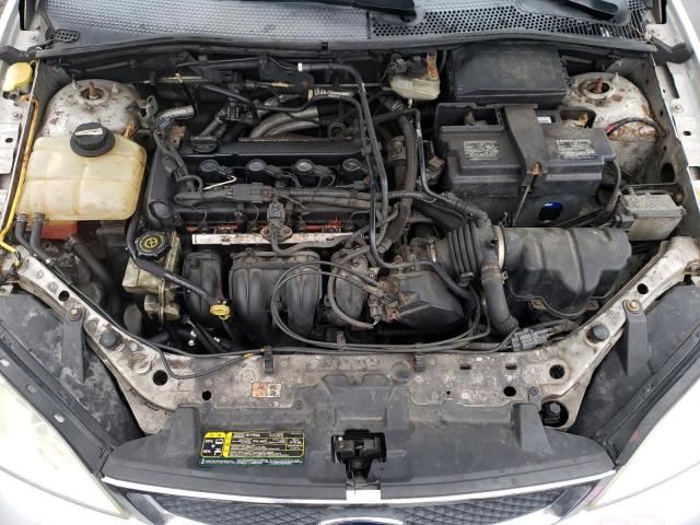 1FAHP34N76W164668 - 2006 FORD FOCUS ZX4 SILVER photo 11