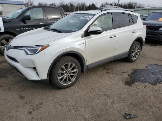 JTMDJREV9JD232579 - 2018 TOYOTA RAV4 HV LIMITED WHITE photo 1