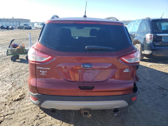 1FMCU9G93GUB35711 - 2016 FORD ESCAPE SE BURGUNDY photo 6