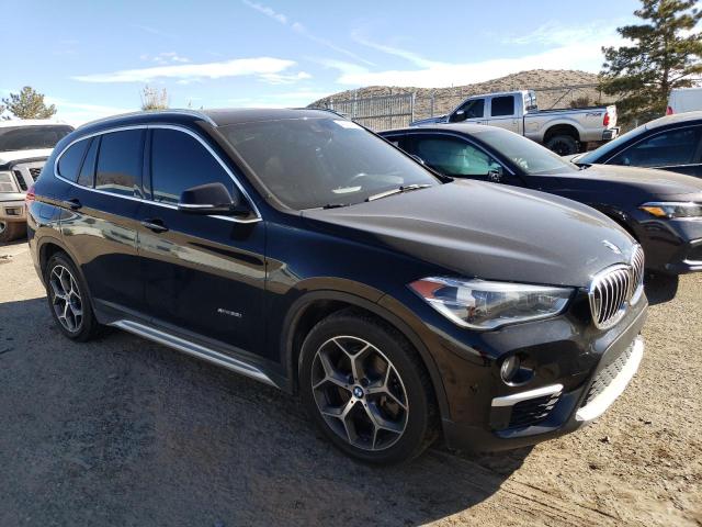 WBXHT3Z31H4A65054 - 2017 BMW X1 XDRIVE28I BLACK photo 4