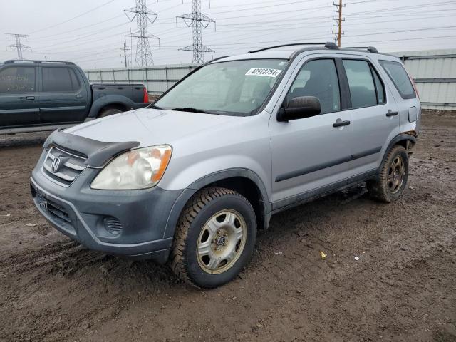 JHLRD78515C055764 - 2005 HONDA CR-V LX SILVER photo 1