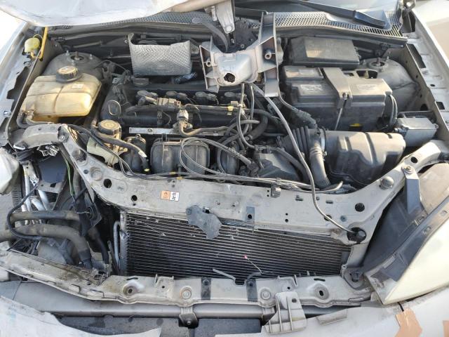 1FAHP34NX7W306738 - 2007 FORD FOCUS ZX4 GOLD photo 11