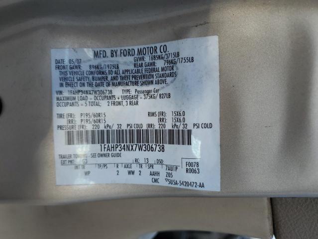 1FAHP34NX7W306738 - 2007 FORD FOCUS ZX4 GOLD photo 13