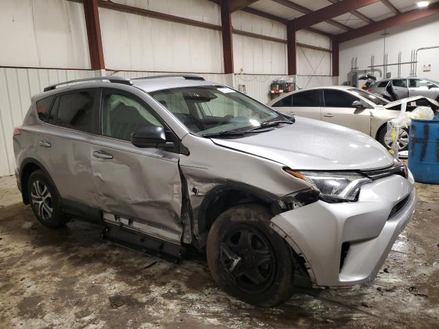 2T3BFREV4HW589786 - 2017 TOYOTA RAV4 LE SILVER photo 4