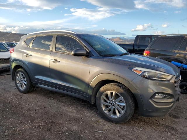 KM8J33A4XGU236944 - 2016 HYUNDAI TUCSON LIMITED GRAY photo 4