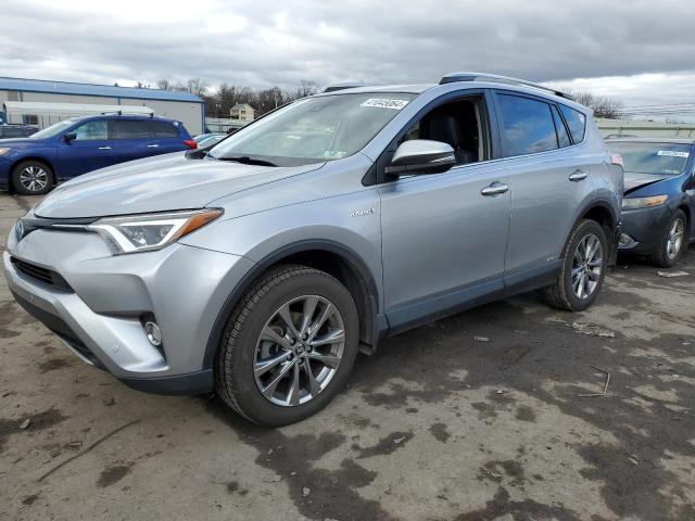 JTMDJREV9JD157205 - 2018 TOYOTA RAV4 HV LIMITED SILVER photo 1