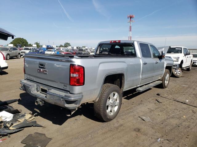 1GT12TEY8JF103504 - 2018 GMC SIERRA K2500 SLT SILVER photo 4