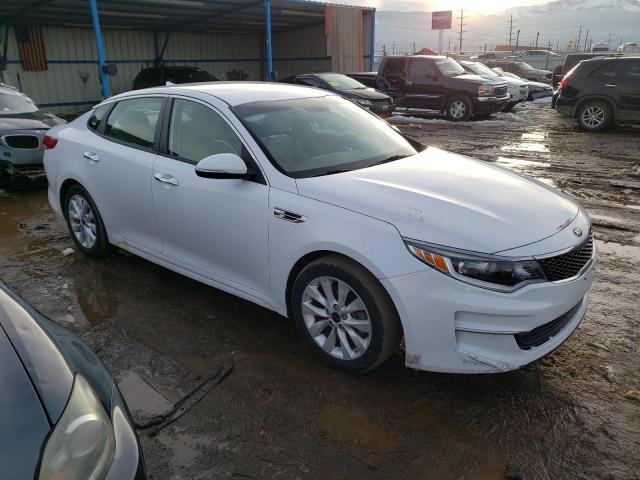 5XXGT4L38GG004437 - 2016 KIA OPTIMA LX WHITE photo 4