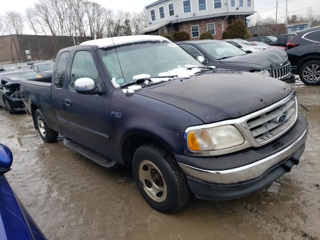 1FTZX1721YNB46387 - 2000 FORD F150 BLUE photo 4