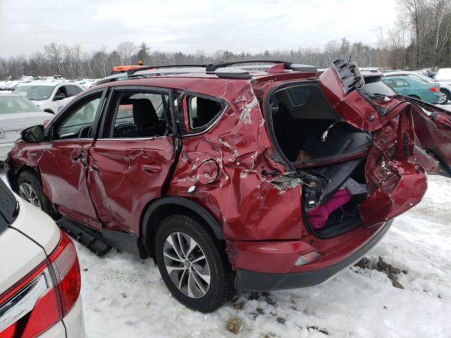 JTMRJREVXJD250143 - 2018 TOYOTA RAV4 HV LE RED photo 2