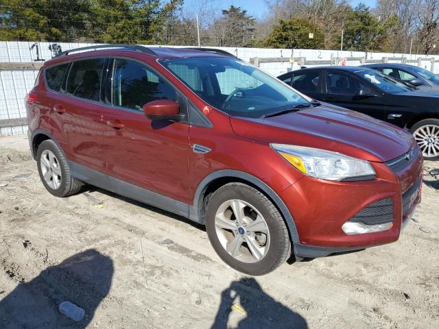 1FMCU0GX3GUB32057 - 2016 FORD ESCAPE SE MAROON photo 4