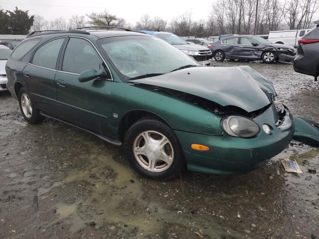 1FAFP58S0XG275903 - 1999 FORD TAURUS SE COMFORT GREEN photo 4