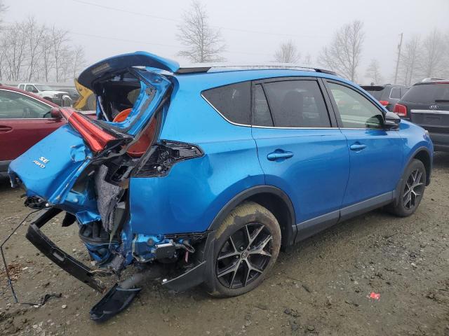 JTMJFREV9JJ257729 - 2018 TOYOTA RAV4 SE BLUE photo 3