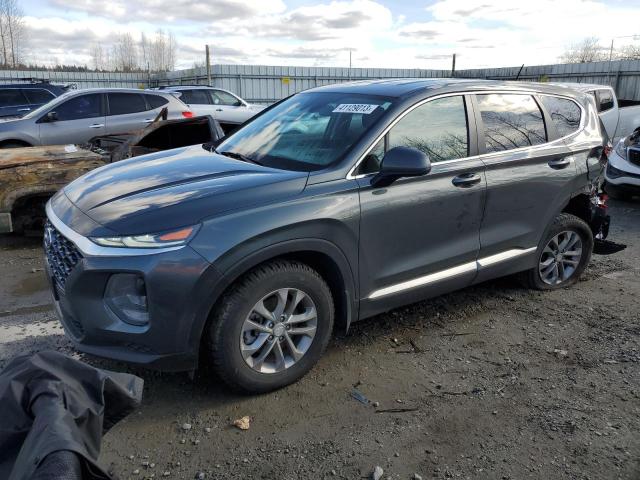 5NMS2CAD2KH125185 - 2019 HYUNDAI SANTA FE SE GRAY photo 1