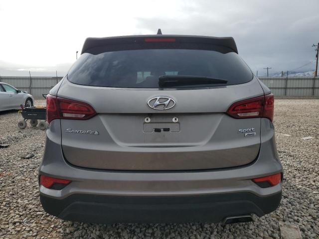 5XYZUDLB6HG389667 - 2017 HYUNDAI SANTA FE S SILVER photo 6