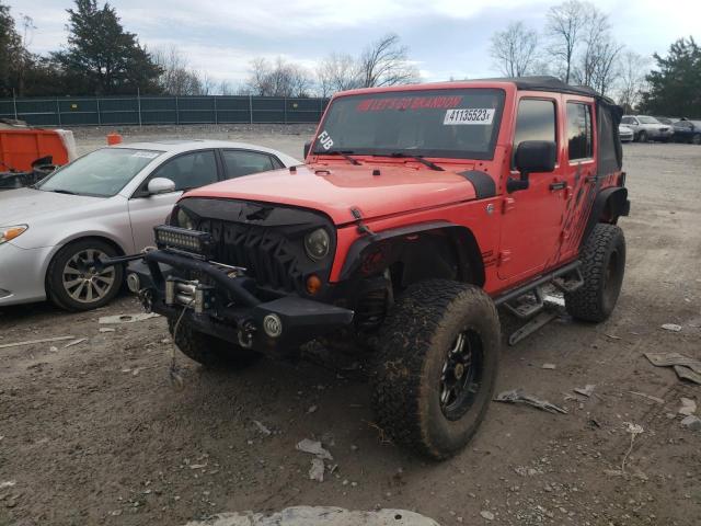 1C4BJWDG3DL669464 - 2013 JEEP WRANGLER U SPORT Orange Foto 1