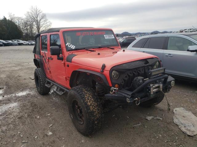 1C4BJWDG3DL669464 - 2013 JEEP WRANGLER U SPORT Orange Foto 4